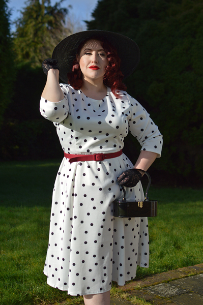 Plus size pinup Miss Amy May models the Black and white Polka dot Janet Beatrix dress by Dolly & Dotty for a fit and size review