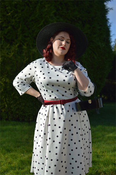 Plus size pinup Miss Amy May models the Black and white Polka dot Janet Beatrix dress by Dolly & Dotty for a fit and size review