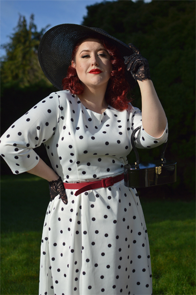 Plus size pinup Miss Amy May models the Black and white Polka dot Janet Beatrix dress by Dolly & Dotty for a fit and size review