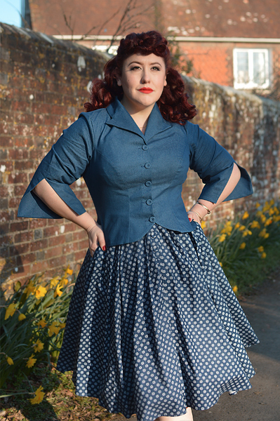 Plus size pinup Miss Amy May models the Khloe-Lee dress and Lizia-Lee Lydia-Lee blazer by Miss Candyfloss for a fit and size reciew