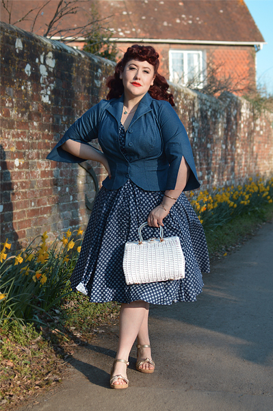 Plus size pinup Miss Amy May models the Khloe-Lee dress and Lizia-Lee Lydia-Lee blazer by Miss Candyfloss for a fit and size reciew