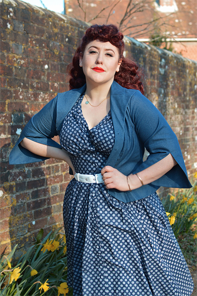 Plus size pinup Miss Amy May models the Khloe-Lee dress and Lizia-Lee Lydia-Lee blazer by Miss Candyfloss for a fit and size reciew