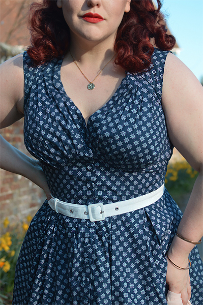 Plus size pinup Miss Amy May models the Khloe-Lee dress and Lizia-Lee Lydia-Lee blazer by Miss Candyfloss for a fit and size reciew