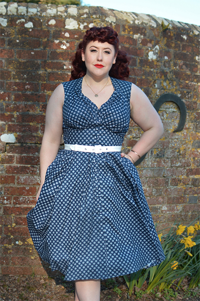 Plus size pinup Miss Amy May models the Khloe-Lee dress and Lizia-Lee Lydia-Lee blazer by Miss Candyfloss for a fit and size reciew
