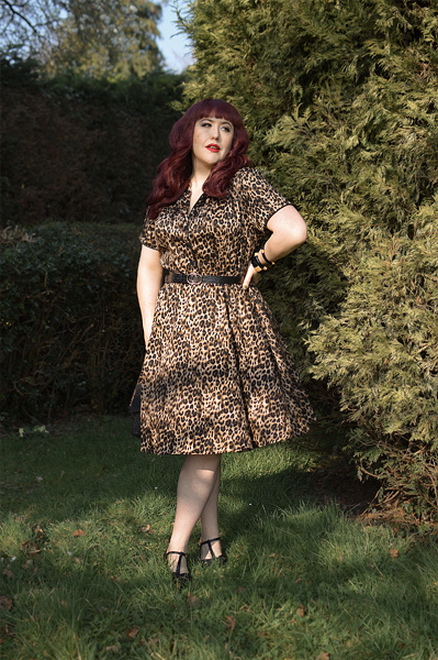 Plus size pinup Miss Amy May models the leopard print Penelope diner shirt dress by Dolly & Dotty for a fit and size review