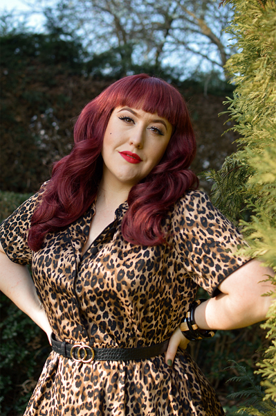 Plus size pinup Miss Amy May models the leopard print Penelope diner shirt dress by Dolly & Dotty for a fit and size review