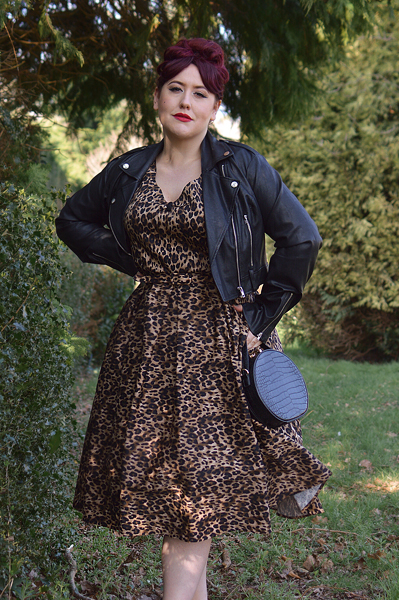 Plus size pinup Miss Amy May models the leopard print off the shoulder Lily dress by Dolly & Dotty for a fit and size review