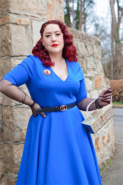 Plus size pinup Miss Amy May models the Myla dress in cobalt blue by The Pretty Dress Company for a fit and size review