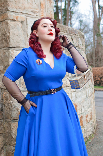 Plus size pinup Miss Amy May models the Myla dress in cobalt blue by The Pretty Dress Company for a fit and size review