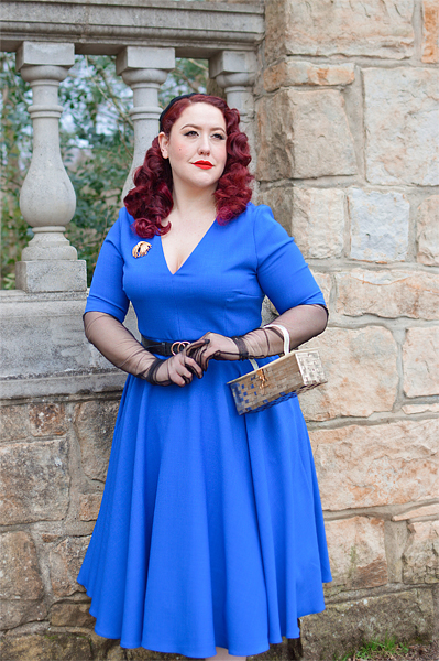 Plus size pinup Miss Amy May models the Myla dress in cobalt blue by The Pretty Dress Company for a fit and size review