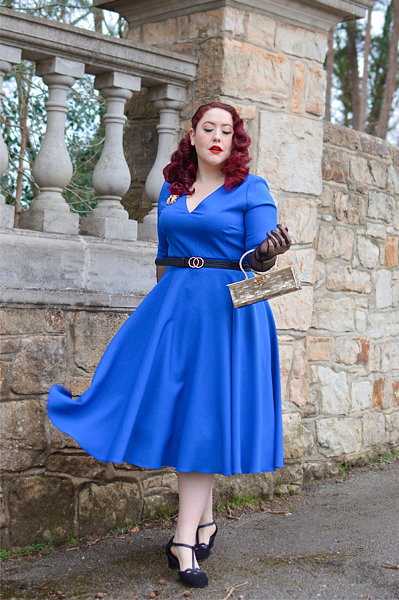 Plus size pinup Miss Amy May models the Myla dress in cobalt blue by The Pretty Dress Company for a fit and size review