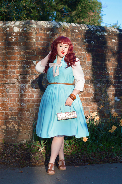 Plus size pinup Miss Amy May models the Cry-Baby dress by Hell Bunny for a fit and size review