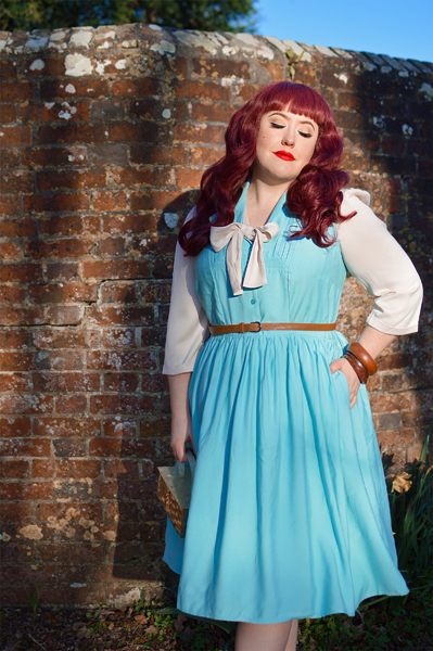 Plus size pinup Miss Amy May models the Cry-Baby dress by Hell Bunny for a fit and size review