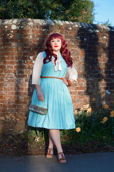 Plus size pinup Miss Amy May models the Cry-Baby dress by Hell Bunny for a fit and size review
