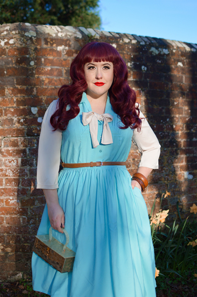 Plus size pinup Miss Amy May models the Cry-Baby dress by Hell Bunny for a fit and size review