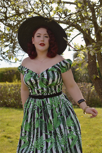 Plus size pinup Miss Amy May models the Solana Mid dress by Hell Bunny for a fit and size review