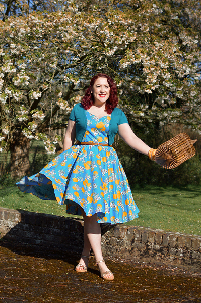 Plus size pinup Miss Amy May models the Valencia 50s dress by Hell Bunny for fit and size review