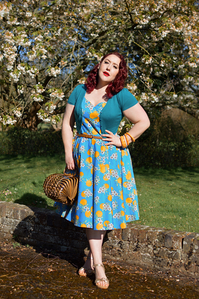 Plus size pinup Miss Amy May models the Valencia 50s dress by Hell Bunny for fit and size review