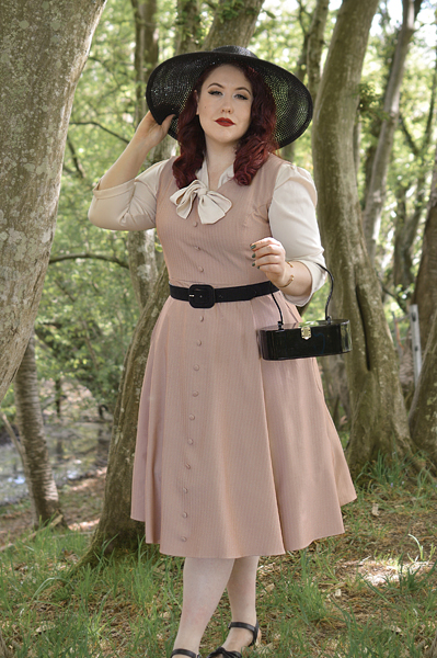 Plus size pinup Miss Amy May models the Alison dress by Hearts and Roses London for fit and size review