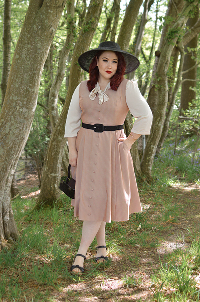 Plus size pinup Miss Amy May models the Alison dress by Hearts and Roses London for fit and size review