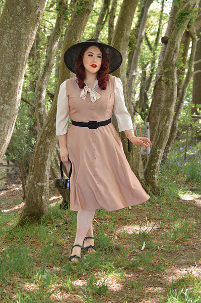 Plus size pinup Miss Amy May models the Alison dress by Hearts and Roses London for fit and size review
