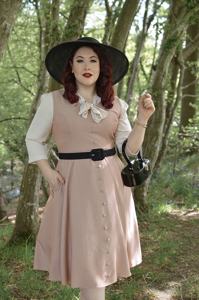 Plus size pinup Miss Amy May models the Alison dress by Hearts and Roses London for fit and size review