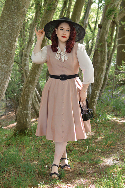 Plus size pinup Miss Amy May models the Alison dress by Hearts and Roses London for fit and size review