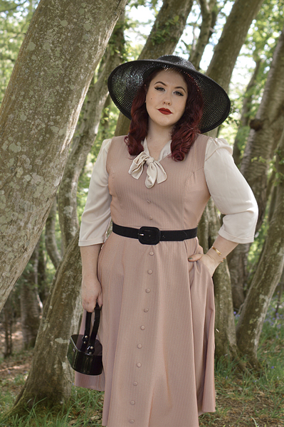 Plus size pinup Miss Amy May models the Alison dress by Hearts and Roses London for fit and size review