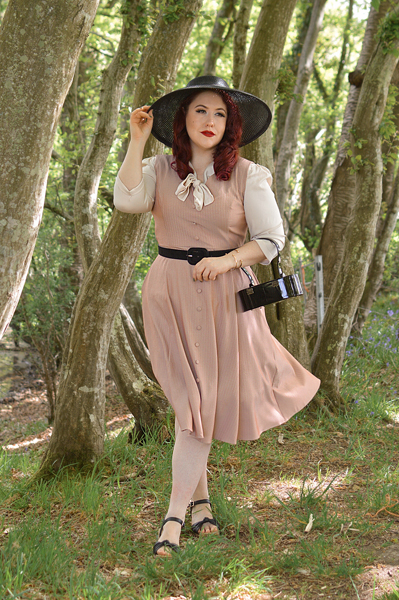 Plus size pinup Miss Amy May models the Alison dress by Hearts and Roses London for fit and size review