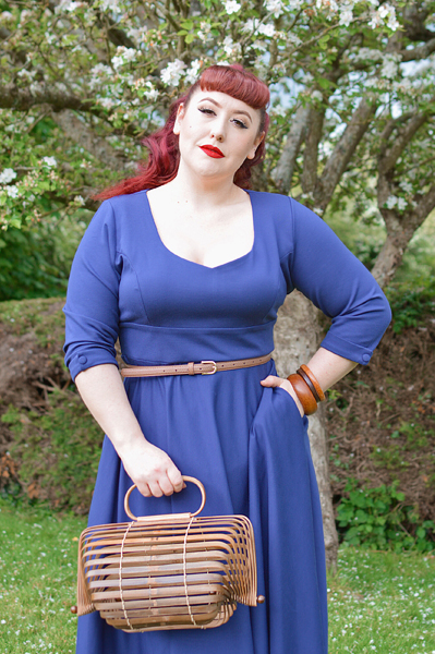Plus size pinup Miss Amy May models the navy Scarlette dress by Dolly and Dotty for a fit and sizing review