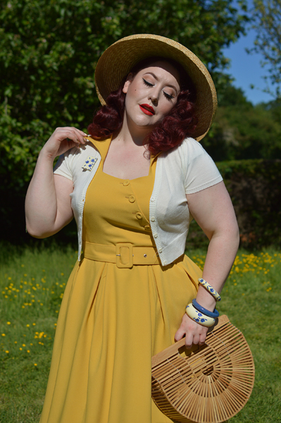 Plus size pinup Miss Amy May models the Selena-Sun dress by Miss Candyfloss for a fit and size review