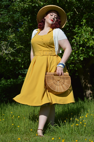 Plus size pinup Miss Amy May models the Selena-Sun dress by Miss Candyfloss for a fit and size review