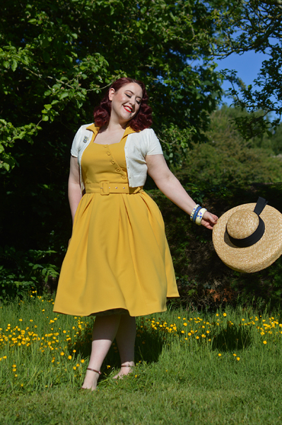 Plus size pinup Miss Amy May models the Selena-Sun dress by Miss Candyfloss for a fit and size review