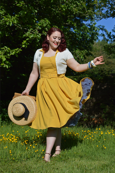 Plus size pinup Miss Amy May models the Selena-Sun dress by Miss Candyfloss for a fit and size review