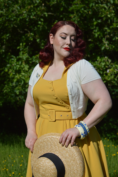 Plus size pinup Miss Amy May models the Selena-Sun dress by Miss Candyfloss for a fit and size review
