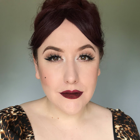 Sleek Matte Me XXL liquid lipstick Vino Tinto in natural lighting