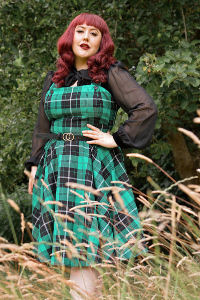 Plus size pinup Miss Amy May models the Beryl pinafore dress by Hell Bunny for a fit and sizing review