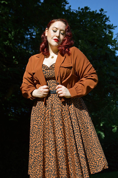 Plus size pinup Miss Amy May models the Ravenwood jackets by Hell Bunny for a fit and sizing review