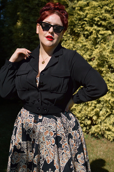 Plus size pinup Miss Amy May models the Ravenwood jackets by Hell Bunny for a fit and sizing review