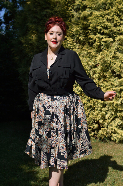 Plus size pinup Miss Amy May models the Ravenwood jackets by Hell Bunny for a fit and sizing review