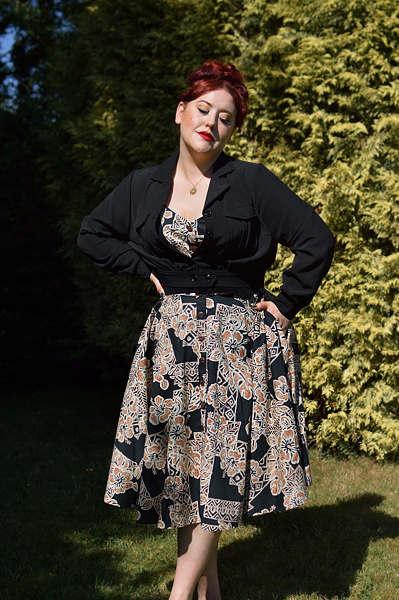 Plus size pinup Miss Amy May models the Ravenwood jackets by Hell Bunny for a fit and sizing review