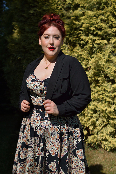 Plus size pinup Miss Amy May models the Ravenwood jackets by Hell Bunny for a fit and sizing review