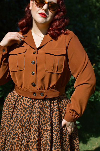 Plus size pinup Miss Amy May models the Ravenwood jackets by Hell Bunny for a fit and sizing review