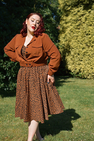 Plus size pinup Miss Amy May models the Ravenwood jackets by Hell Bunny for a fit and sizing review