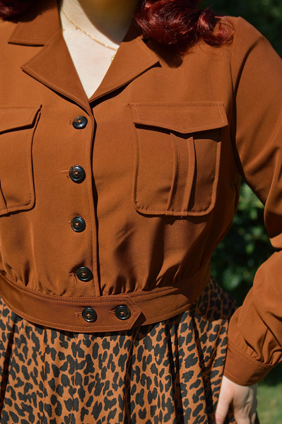 Plus size pinup Miss Amy May models the Ravenwood jackets by Hell Bunny for a fit and sizing review