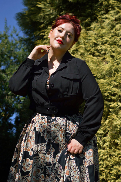 Plus size pinup Miss Amy May models the Ravenwood jackets by Hell Bunny for a fit and sizing review