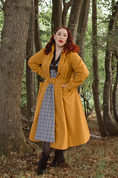 Plus size pinuo Miss Amy May models the Lucinda-Marigold coat by Miss Candyfloss for a fit and size review