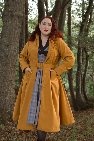 Plus size pinuo Miss Amy May models the Lucinda-Marigold coat by Miss Candyfloss for a fit and size review