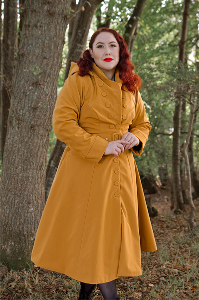 Plus size pinuo Miss Amy May models the Lucinda-Marigold coat by Miss Candyfloss for a fit and size review