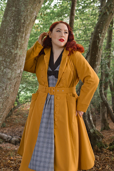 Plus size pinuo Miss Amy May models the Lucinda-Marigold coat by Miss Candyfloss for a fit and size review